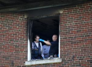 Investigators inspect the fire-damaged multimillion-dollar &hellip;