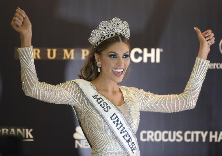 Miss Venezuela and Miss Universe 2013 Gabriela Isler celebrates during a press conference after the 2013 Miss Universe competition in Moscow on November 9, 2013