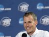Florida Gulf Coast head coach Andy Enfield smiles during a news conference for a third-round game of the NCAA college basketball tournament, Saturday, March 23, 2013, in Philadelphia. Florida Gulf Coast is scheduled to play San Diego State on Sunday. (AP Photo/Michael Perez)