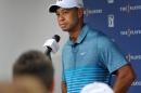 Tiger Woods talks with the media after a practice round for The Players Championship golf tournament in Ponte Vedra Beach, Fla., Tuesday, May 5, 2015. (William Dickey/The Florida Times-Union via AP)