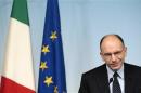 Italian Prime Minister Enrico Letta looks on during a news conference at Chigi palace in Rome