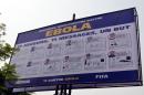 A board bearing the "11 against Ebola", a joint campaign between FIFA, the CAF and health experts, to raise awareness in the fight against Ebola on December 17, 2014
