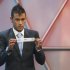 Brazil's soccer player Neymar of Brazil, shows a piece of paper with the country's name Kenya during the Preliminary Draw of the 2014 FIFA World Cup Brazil in Rio de Janeiro, Brazil, Saturday July 30, 2011. The 2014 World Cup takes shape Saturday as the qualifying draw lays out each nation's path to securing a spot in the tournament in three years' time. The draw determined the layout of the qualifying groups for Africa; North, Central America and the Caribbean; Asia; Europe; and Oceania.  (AP Photo/Felipe Dana)