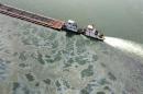 US Coast Guard photo shows barge loaded with marine fuel oil partially submerged in the Houston Ship Channel