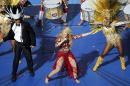 Shakira performs during the closing ceremony for the soccer World Cup at the Maracana Stadium in Rio de Janeiro, Brazil, Sunday, July 13, 2014. (AP Photo/Fabrizio Bensch, Pool)