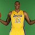 New center Dwight Howard poses for photos during NBA media day for the Los Angeles Lakers basketball team in Los Angeles