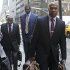 NBA Players Association president Derek Fisher, right, NBA union chief Billy Hunter, left, and LA Lakers' Theo Ratliff arrive at a midtown hotel for a meeting with the NBA, Monday, Aug. 1, 2011 in New York. One month after the lockout began, and three months before the season is scheduled to start, representatives for the NBA owners and locked-out players return to the bargaining table.   (AP Photo/Mary Altaffer)