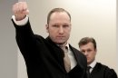 FILE - In this Tuesday, April 17, 2012 file photo, accused Norwegian Anders Behring Breivik gestures as he arrives at the courtroom, in Oslo, Norway. Those expecting Anders Behring Breivik to spend the rest of his days alone in a cramped cell will be disappointed when the far-right fanatic receives his sentence Friday for killing 77 people in a bomb and gun rampage last year. If declared insane, the confessed killer will be the sole patient of a psychiatric ward that Norway built just for him, with 17 people on staff to treat him. If found mentally fit, he will remain isolated, for now, in the high-security prison where he disposes of three 86-square-foot (8-square-meter) cells: a bed room, an exercise room and a study. (AP Photo/Hakon Mosvold Larsen/Scanpix Norway, Pool, File)