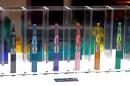 A window display with different colour models of electronic cigarettes is seen in a shop in Paris