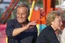 Senate candidate Rep. Todd Akin, R-Mo., campaigns his wife Lulli, right, during the Northwest Missouri State Fair in Bethany, Mo., Thursday, Aug. 30, 2012. It was Akin's first public interaction with voters since his Aug. 19 comment in a TV interview that women's bodies have ways of averting pregnancy from what he called "legitimate rape." The comment prompted widespread backlash, with some Republicans urging him to quit the race against Democratic Sen. Claire McCaskill. (AP Photo/Orlin Wagner)