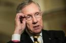 US Senate Majority Leader, Harry Reid, speaks to reporters on Capitol Hill, in Washington, DC, on March 5, 2014