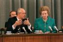 Then-Soviet President Mikhail Gorbachev talks to then-Bristish Prime Minister Margaret Thatcher during their joint press conference in Moscow on June 8, 1990