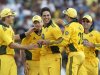 Australian cricketer Mitchell Johnson, center is congratulated by teammates after he took a Sri Lankan wicket during the first One Day International (ODI) cricket match between Sri Lanka and Australia in Pallekele, Sri Lanka, Wednesday, Aug. 10, 2011. (AP Photo)
