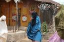 Women are seen on the street in Kaduna