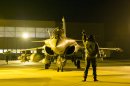 This Sunday Jan.13, 2013 photo provided by the French Army Monday Jan.14, 2013 shows French Rafale jetfighters being prepared before heading to Mali from the Saint Dizier airbase, eastern France. French fighter jets bombed rebel targets in a major city in Mali's north Sunday, pounding the airport as well as training camps, warehouses and buildings used by the al-Qaida-linked Islamists controlling the area, officials and residents said. (AP Photo/Laure-Anne Maucorps, ECPAD)