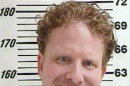 FILE -This undated file photo provided by the Davis County Jail, shows Jeremy Johnson, a Utah businessman accused of running a $350 million fraud scheme through his company is planning changing his plea Friday Jan. 11, 2013. Federal prosecutors have charged Johnson with one count of mail fraud in U.S. District Court in Salt Lake City, and if convicted he faces up to 20 years in prison. (AP Photo/ Davis County Jail, File)