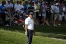 Phil Mickelson reacts to his shot on the sixth hole during the third round of the U.S. Open golf tournament at Merion Golf Club, Saturday, June 15, 2013, in Ardmore, Pa. (AP Photo/Charlie Riedel)
