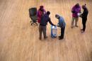 Locals cast their votes during the local government elections at the Johannesburg city hall, South Africa