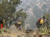 Firefighters from the Granite Mountain Hotshots of Prescott, Ariz., cut a fire line along a mountain ridge outside Mogollon, N.M., on Saturday, June 2, 2012. The crew is part of an effort to manage and contain the Whitewater-Baldy fire which has burned more than 354 square miles of the Gila National Forest in New Mexico.  (AP Photo/U.S. Forest Service, Tara Ross)