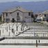 In this photo taken June 22, 2011, finished home foundations await the construction of new homes by Lennar in Santa Clarita, Calif. Lennar Corp.'s fiscal third-quarter profit dropped 31 percent Monday, Sept. 19, 2011, as the company delivered fewer homes. (AP Photo/Damian Dovarganes)