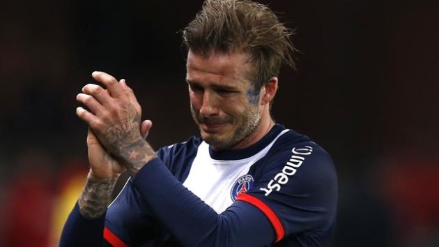 David Beckham is in tears as he is subbed off in his final football match, where Paris Saint-Germain beat Brest (Reuters)