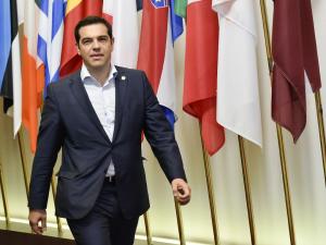 Greek Prime Minister Alexis Tsipras arrives to speak &hellip;