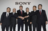 <p>               Sony Corp. President and Chief Executive Officer Kazuo Hirai, third from left, poses for photographers with the corporate executives, from left, Executive Deputy President Hiroshi Yoshioka, Executive Vice President and Chief Financial Officer Masaru Kato, Hirai, EVP Tadashi Saito, EVP Shoji Nemoto, and EVP Kunimasa Suzuki after a press conference in Tokyo, Thursday, April 12, 2012. Hirai outlined his business strategy and pledged to revive the electronics and entertainment company. (AP Photo/Shizuo Kambayashi)