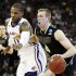 Kansas forward Thomas Robinson (0) covers Purdue forward Robbie Hummel (4) during the first half of a third-round NCAA college basketball tournament game at CenturyLink Center in Omaha, Neb., Sunday, March 18, 2012. (AP Photo/Orlin Wagner)