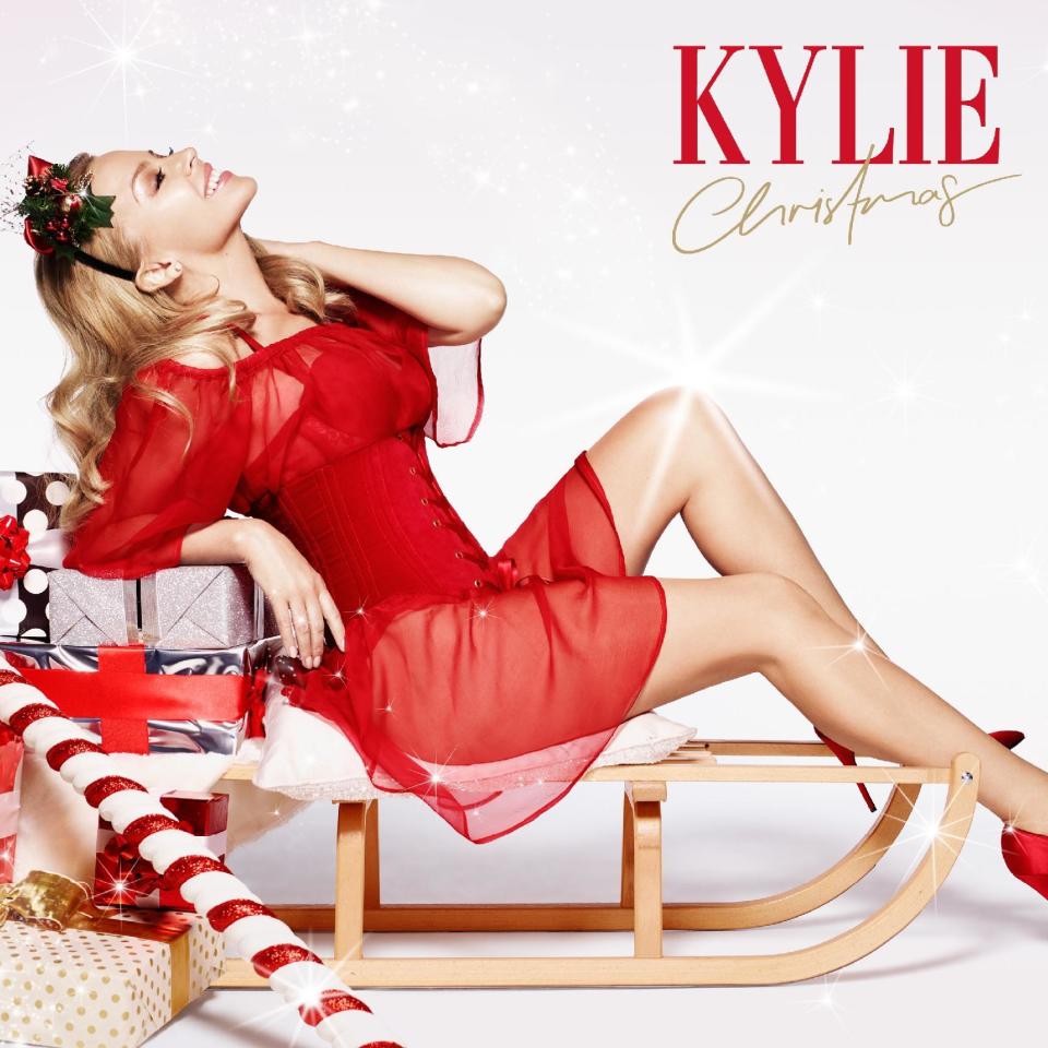 This CD cover image released by Warner Bros./Parlophone shows Kylie Minogue&#39;s holiday album, &quot;Kylie Christmas.&quot; Minogue's first...