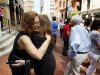 Co-workers Susan Sproul, left, and Susan Davidson hug after evacuating from their building after an earthquake was felt in Baltimore, Tuesday, Aug. 23, 2011. Downtown office buildings were cleared and workers were waiting for clearance to re-enter. (AP Photo/Patrick Semansky)