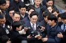 File Photo: Samsung Group chief, Jay Y. Lee, leaves after attending a court hearing to review a detention warrant request against him at the Seoul Central District Court in Seoul