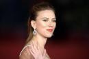 Cast member Scarlett Johansson arrives for a red carpet event for the movie "Her" at the Rome Film Festival