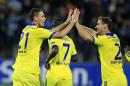 Chelsea's Nemanja Matic, left, celebrates his goal with teammates during the Champions League group G soccer match between Chelsea FC and Maribor, in Maribor, Slovenia, Wednesday, Nov. 5, 2014.(AP Photo/Nikola Solic)
