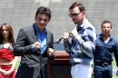 FILE - In this April 24, 2012, file photo Julio Cesar Chavez Jr. left, and his opponent Andy Lee pose for pictures during a news conference at Sun Bowl Stadium in El Paso, Texas. A federal risk assessment of the West Texas boxing match between the two that had been cancelled, predicted it would draw leaders from two rival drug cartels, but noted the cartels had declared the event a 