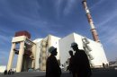 Workers outside the reactor building at the Russian-built Bushehr nuclear plant in southern Iran on October 26, 2013