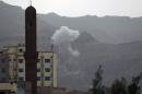 Smoke rises from the Faj Attan Hill area in the Yemeni capital Sanaa on April 7, 2015, following an alleged air strike by the Saudi-led alliance on Shiite Huthi rebels camps