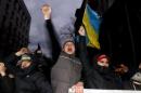 Putin: Ukraine protests seek to shake legitimate rulers