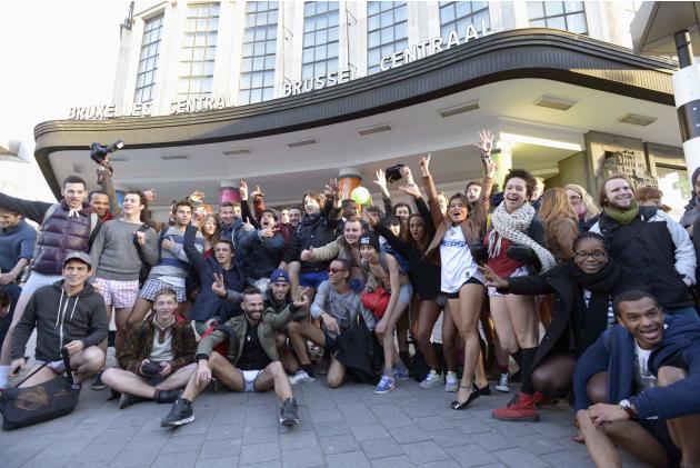 People take part in the annual "No Pants Subway Ride" celebrations on the streets of Brussels