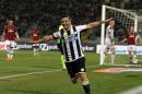 Udinese's Antonio Di Natale, celebrates after scoring during the Serie A soccer match between Udinese and AC Milan at the Friuli Stadium in Udine, Italy, Saturday, March 8, 2014. (AP Photo/Paolo Giovannini)