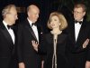 FILE - In this Jan. 18, 1995, file photo, then first lady Hillary Rodham Clinton gestures as she speaks with Rupert Murdoch, left, chairman of the News Corporation Limited, Thomas Murphy, chairman and CEO of Capital Cities/ABC, Inc., and Howard Stringer, right, president of CBS Broadcast Group, at a reception before the 40th Annual United Cerebral Palsy Awards Dinner in New York. Murdoch is a political kingmaker in England and his native Australia. In the United States, he’s best known for promoting conservative opinion through media properties like the Fox News Channel. Murdoch is not as personally connected to political leadership in the U.S., where he is a naturalized citizen. (AP Photo/Ron Frehm, File)