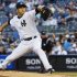 New York Yankees' Kuroda pitches to the Toronto Blue Jays in their MLB American League baseball game in New York