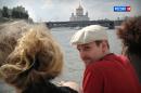 In this video frame grab provided by LifeNews via Rossia 24 TV channel, which has been authenticated based on its contents and other AP reporting, former National Security Agency systems analyst Edward Snowden looks over his shoulder during a boat trip on the Moscow River in Moscow, with the Christ the Savior Cathedral in the background. LifeNews said the video was shot in September 2013 and Snowden's lawyer, Anatoly Kucherena, confirmed the photo's authenticity. Snowden is calling for international help to persuade the U.S. to drop its espionage charges against him, according to a letter a German lawmaker released Friday after he met the American in Moscow. (AP Photo/LifeNews via Rossia 24 TV channel) TV OUT