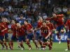 Spain's players celebrate after defeating Portugal in Euro 2012 semi-final soccer match in Donetsk