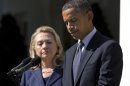 In this Sept. 12, 2012, photo, President Barack Obama, accompanied by Secretary of State Hillary Rodham Clinton, speaks in the Rose Garden of the White House in Washington, about the death of U.S. ambassador to Libya Christopher Stevens. His eye fixed firmly on securing a second term, Obama had hoped that the rest of the world would wait until after the election if it had to grow restless and demand his attention. The eruptions in the streets of the Arab world, inflamed by an anti-Muslim video made in the U.S., mean Obama can put it off no longer. The protests are testing the president's foreign policy skills and giving voters a pre-election view of how he handles a crisis. (AP Photo/Evan Vucci)