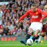 Wayne Rooney scores a penalty