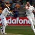 Australia's Siddle celebrates taking the wicket of Sri Lanka's Sangakkara during the first test cricket match in Hobart