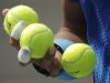 Rafael Nadal of Spain selects a ball to serve to David Nalbandian of Argentina during the U.S. Open tennis tournament in New York, Sunday, Sept. 4, 2011. (AP Photo/Charlie Riedel)
