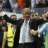 Malaga's coach Pellegrini celebrates their victory over Sporting de Gijon after their Spanish First Division soccer match at La Rosaleda stadium in Malaga