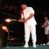 FILE - In this Friday, July 19, 1996 file photo, boxing legend Muhammed Ali lights the Olympic flame, as American swimmer Janet Evans looks on during the 1996 Summer Olympic Games opening ceremony in Atlanta. Only London Olympics Opening Ceremony director Danny Boyle and a few well-informed others will know for certain if British newspapers are wrong with their speculation that Ali could play a role on Friday night July 27, 2012 when the ceremony is held. (AP Photo/Michael Probst)