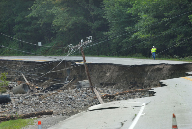 Route 4 in Mendon, Vt. is damaged as work crews evaluate their next move after Hurricane Irene on Monday, Aug 29, 2011. The highway is in between Rutland, Vt., and Killington, Vt.  (AP Photo/The Daily
